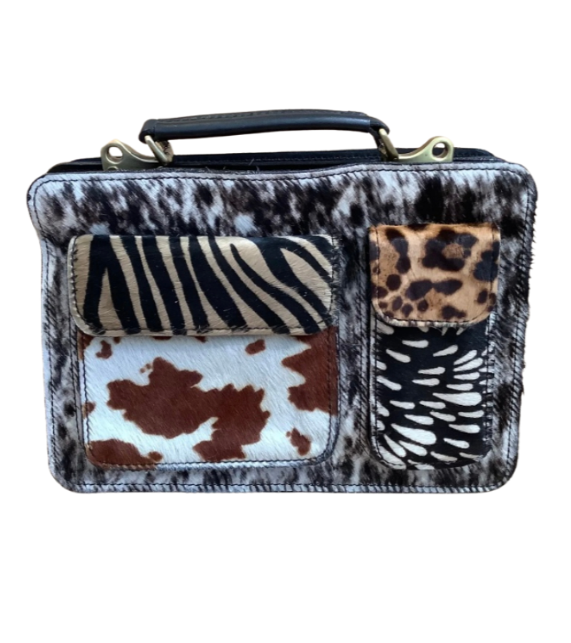 Cartera de piel animal print con pelo natural y cremallera