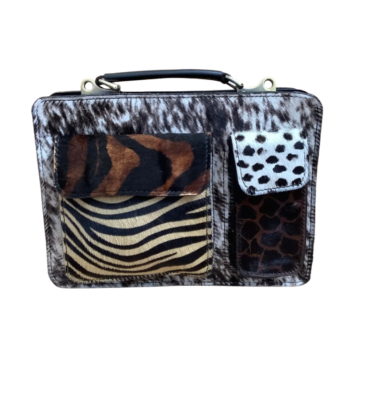 Cartera de piel animal print con pelo natural y cremallera