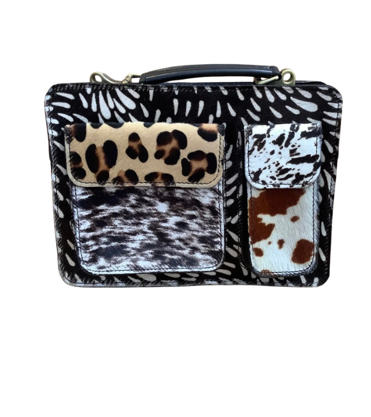 Cartera de piel animal print con pelo natural y cremallera